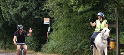 Say Hi Cyclist And Horse