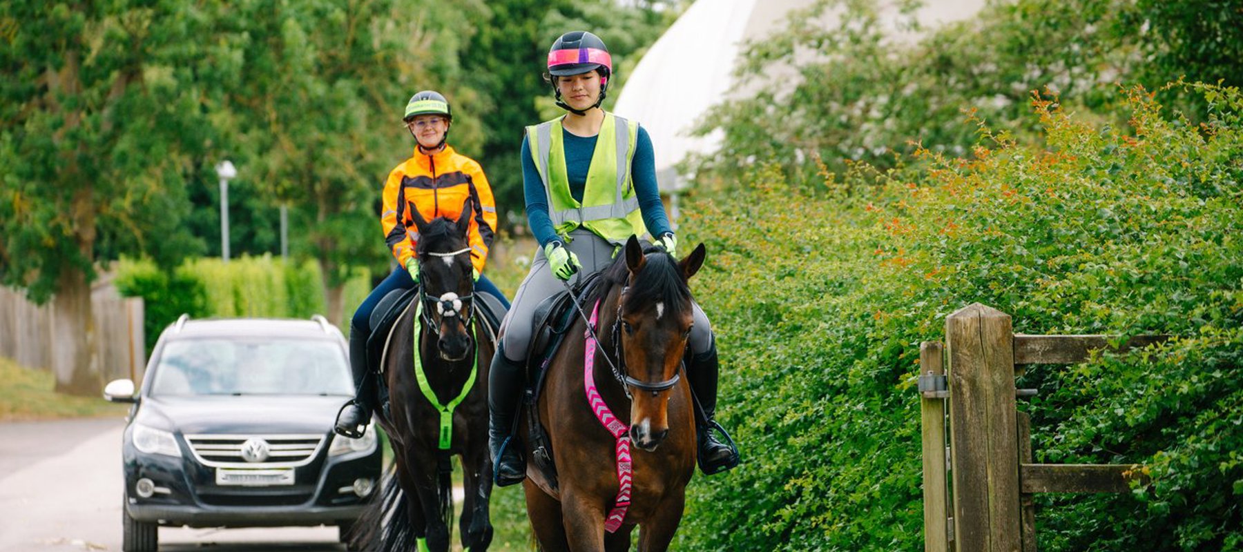 Horses And Riders In Hi Vis Hacking On The Road (1)